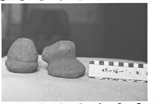 Two Carved Stone Pestles