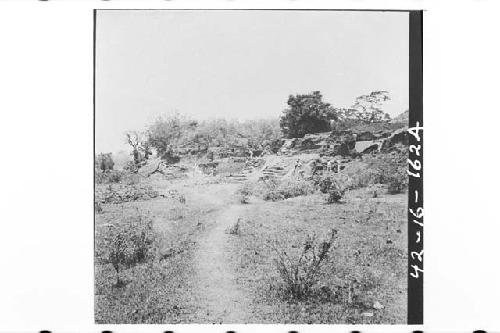 Panorama of north side and destroyed NW quarter of platform. Mound 1 rises above