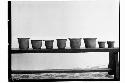 8 flower pots, part of ceremonial offering found under altar to Stela J