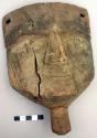 Carved wooden head - formerly painted; projection from the neck for +