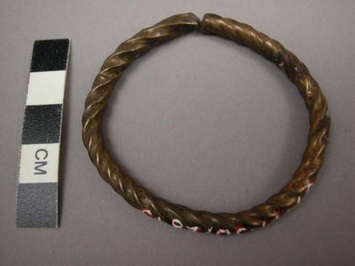 Brass bracelet used to make impression on pottery