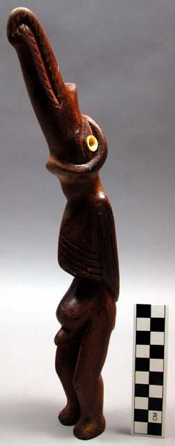 Carved birdman figure