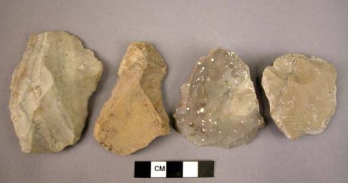 5 broad flint flakes showing signs of use