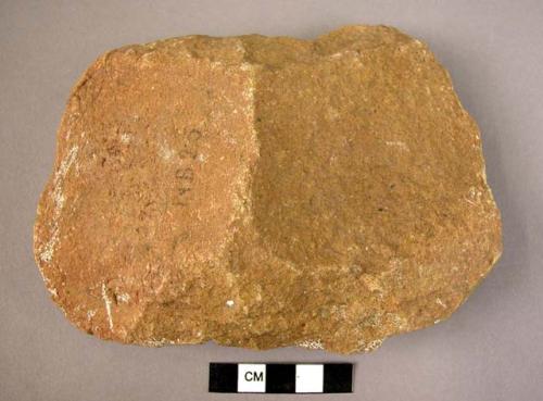 Large-sized quartzite cleaver with "U" shaped butt with straight cutting edge