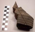 Fragment of wooden bulls leg - from Angareb