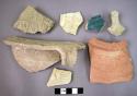 Potsherds, 12 (most with incised decoration, 1 with greenish glaze)
