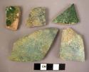 5 potsherds - dark green on red-brown clay (from large jars)