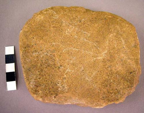 Abrading or rubbing stone with notch