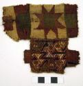 Organic, textile fragment with geometric motifs, green, brown, black, and beige