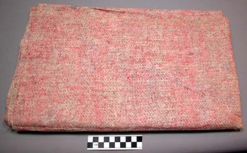 Tapa cloth, rectangular folded, buff with diamond and dot pattern, pink other