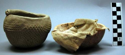 Unfinished pot in gourd holder - cloth between pot and gourd holder