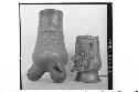 Plumbate head jar on annular base and plumbate pear-shaped tripod, incised.