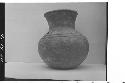 Plumbate standard jar, upper shoulder incised.