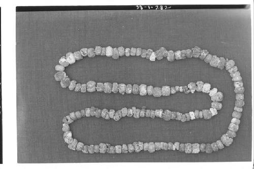 Shell beads (A-556). Largest beads-8 cm. diam