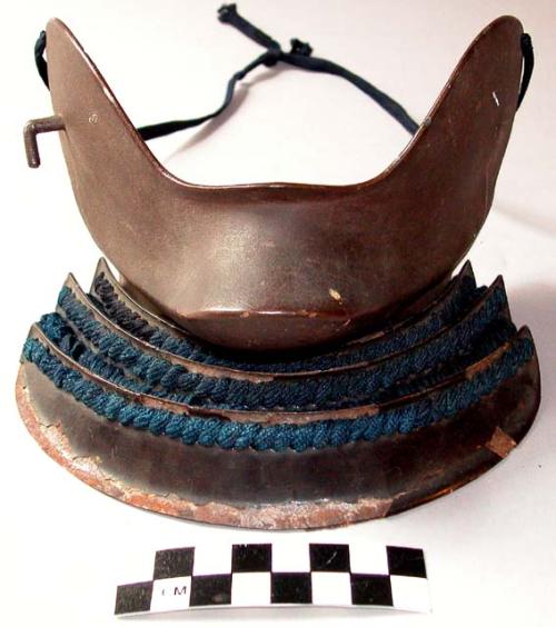 Armor: face mask, chin cover, bent metal spike on cheek