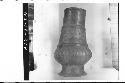 Plumbate lampchimney, gadrooned, incised.