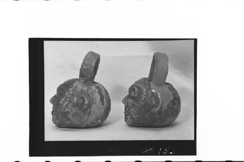 Two small plumbate vessels with loop, basket handles, cat.# 43-9-147, 148, and T