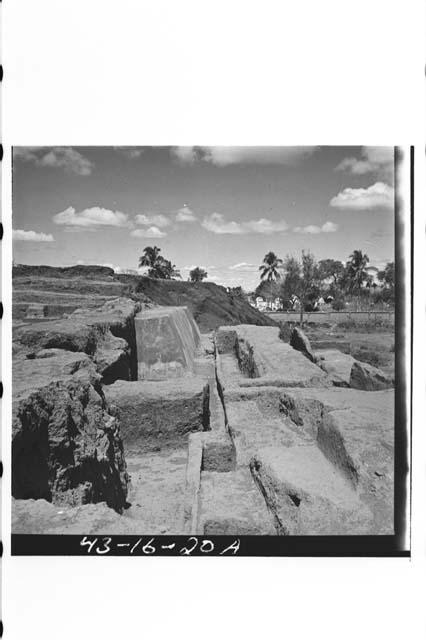 Two views looking west at early construction in N. boundary wall of platform fro