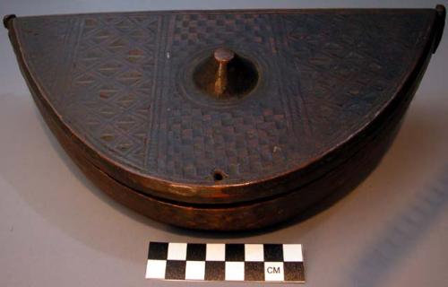 Crescent shaped, 2 part tukula cosmetic box, with geometric designs incised on t