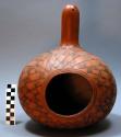 Gourd, incised geometric design, perforated top, hole at side