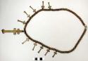 Brass necklace of beads and crosses (about 1870)