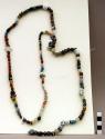 Necklace of 141 assorted glass beads