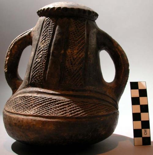 Jugs, black, incised