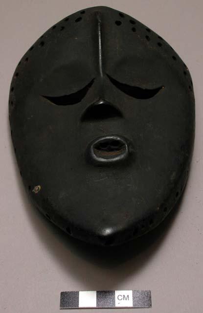 Wooden face mask.