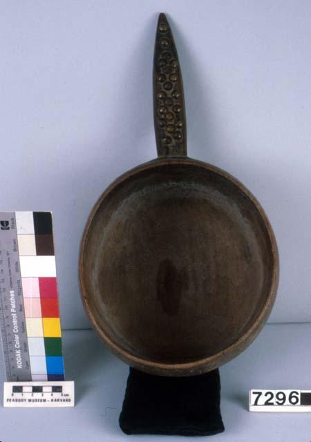 Wooden bowl with handle, bunga's ceremonial feast bowl from which he ate  with his peers