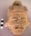Head of terra-cotta effigy (human)