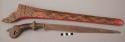 Carved and painted wooden scabbard for kris (cf. 70/3065)