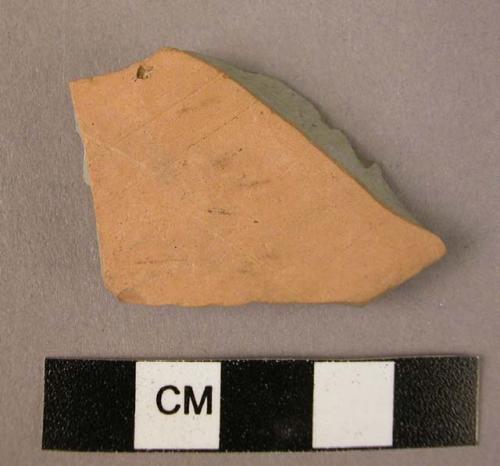 Ceramic body sherd, fine wheel made ware, buff slipped, grey core