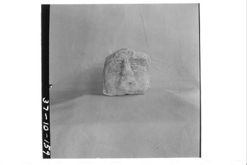 Human head of stucco.  Cat. No. 5054 from Structure B-XIII