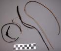 Fiber fragments, reed strips, tangled thread
