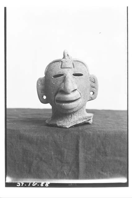 Head of figurine from Tomb VI