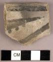 Black on grey potsherd