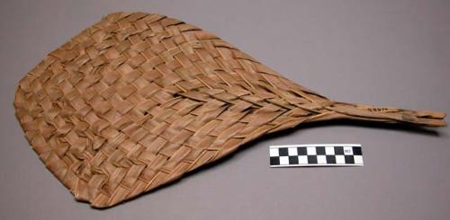 Palm leaf fans used principally for fanning fire