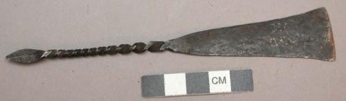 Metal knife; one flat blade; with a spiral-twisted handle, curled at the end