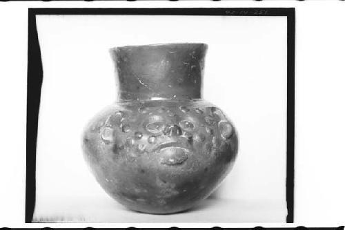 Plumbate Human Head Jar, Button Face