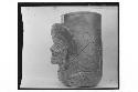 Plumbate human head and arm jar;