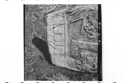 Front detail of glyph panel at top of Stela 10