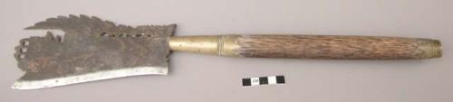Steel-bladed wooden-handled knife with brass fittings. +
