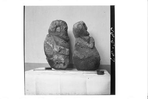 Two Stone Figures seen in Profile