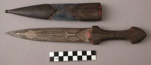 Engraved qama or kindjal dagger with leather sheath