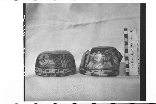 2 small polychrome bowls.