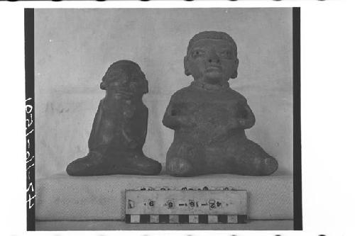 Two Seated Human Effigy Pottery Figurines