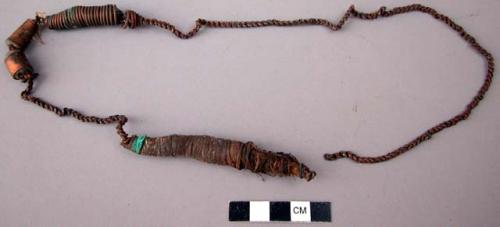 Iron wire necklace with copper spiral ornaments and medicine