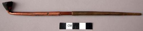 Woman's tobacco pipe of copper and brass
