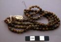Double strand of wooden beads