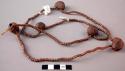 Necklace of copper and brass beads (and five iron bells)